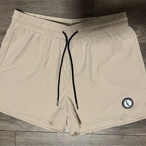 Lumber Legs “cream” gym shorts